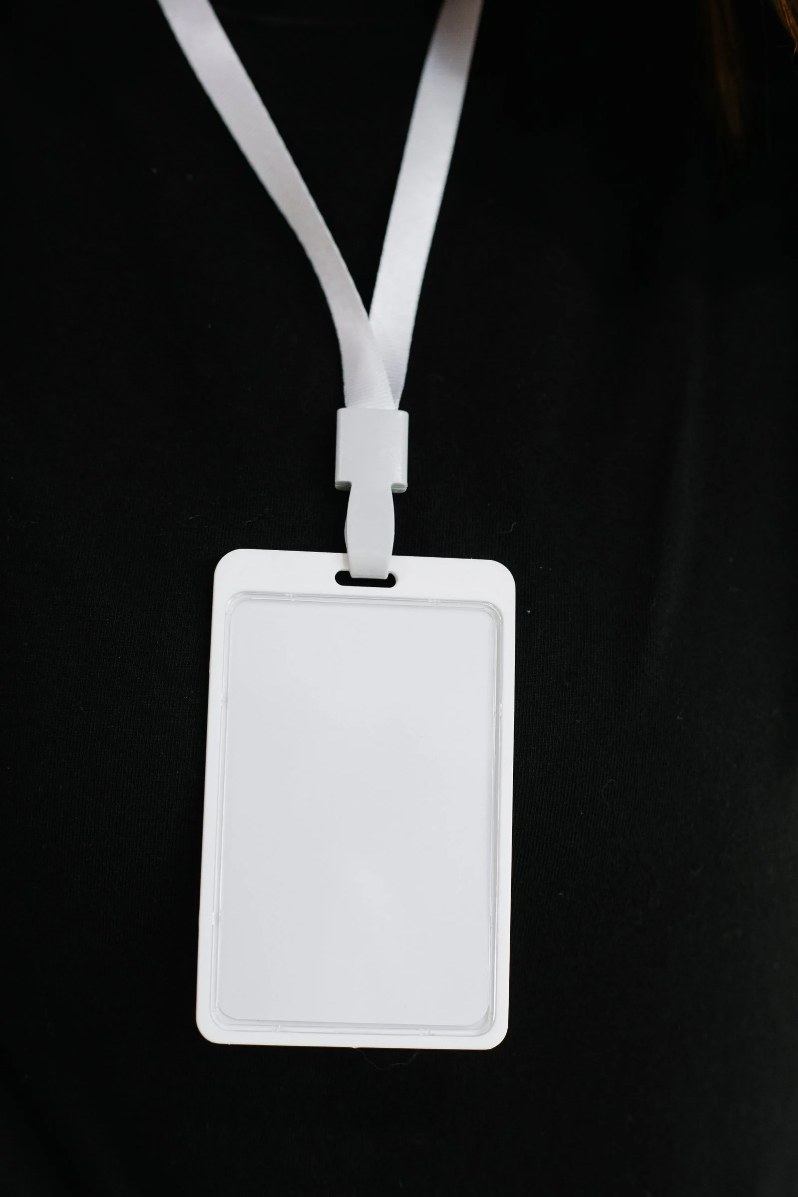 Blank identification card in a plastic holder